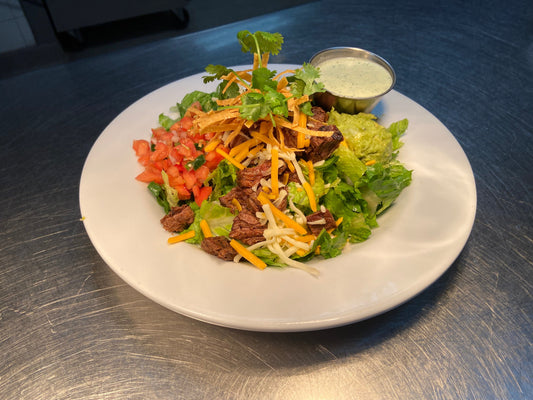 Carne Asada Steak Salad. With Pico de Gallo, Guacamole, Jalapeno Ranch Dressing